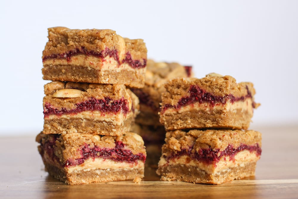 Stacks of Gaia Tree's peanut butter and jelly slice