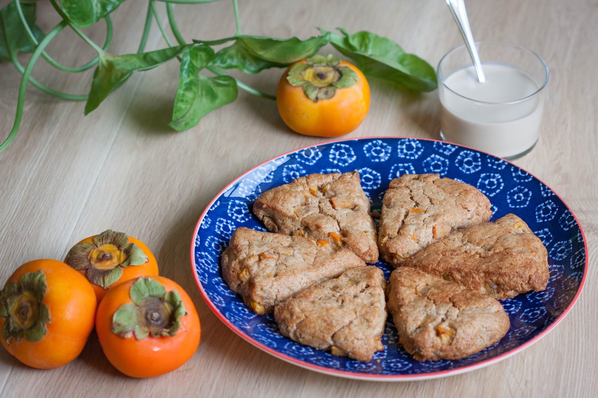 Vegan persimmon cinnamon scones by Gaia Tree with a creamy coconut side sauce