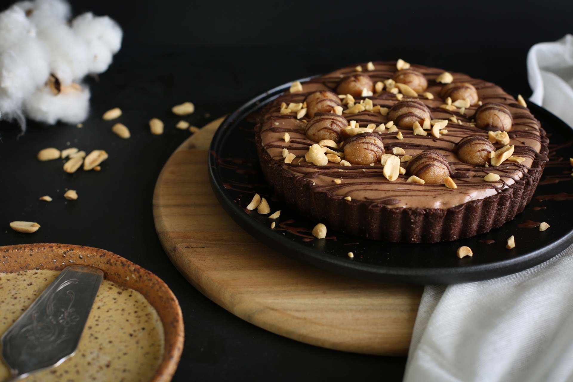 Side view of a banana and peanut butter tart